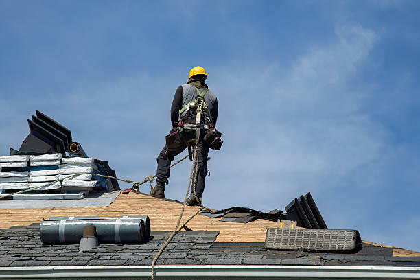 Professional Roofing technician working in High Hill, MO